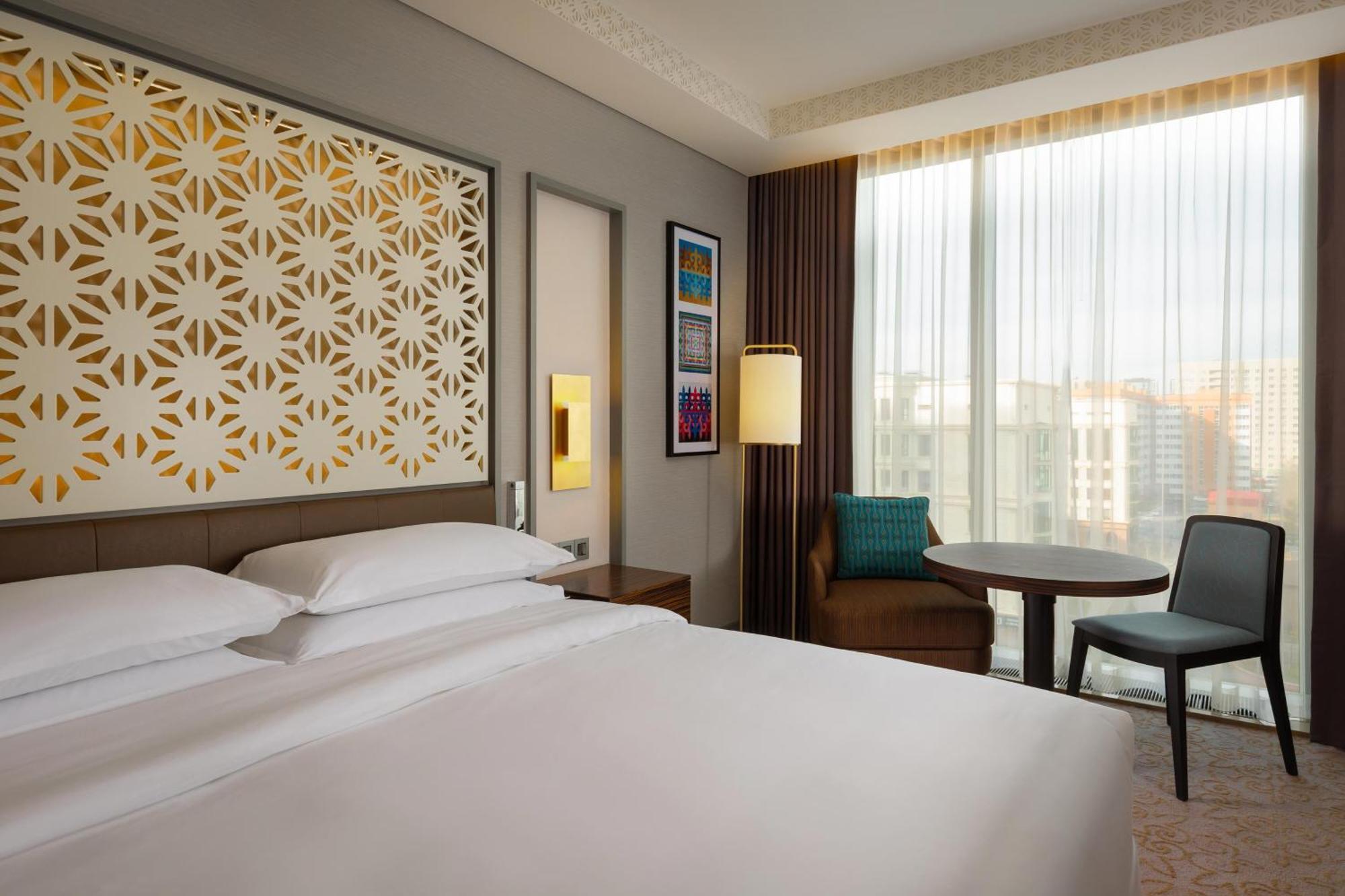 Sheraton Astana Hotel Exterior photo A guest room at the hotel